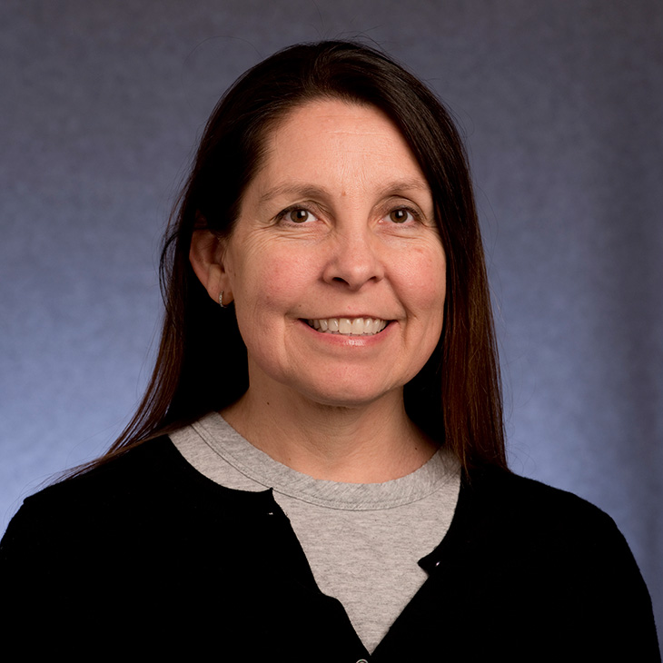 Portrait of Dr. Joanna Shadlow, an OSU-Tulsa psychology professor and co-investigator on a $3.4 million NIH-funded project developing a chronic pain intervention for Native American communities.