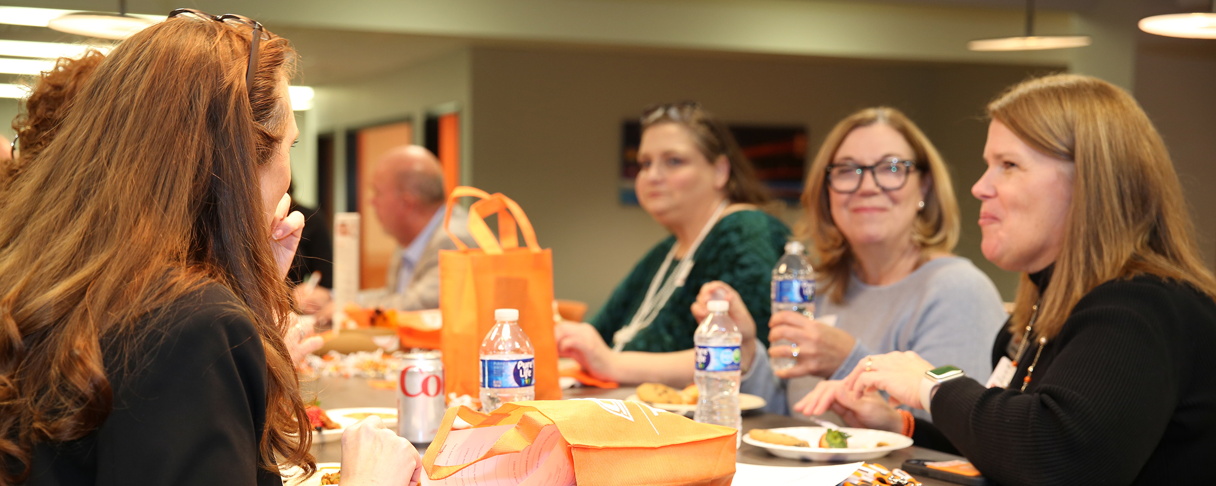 Partygoers gather in the OSU-Tulsa Student Union in North Hall to "party like it's 1999."