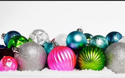 A collection of different-colored Christmas ornaments.