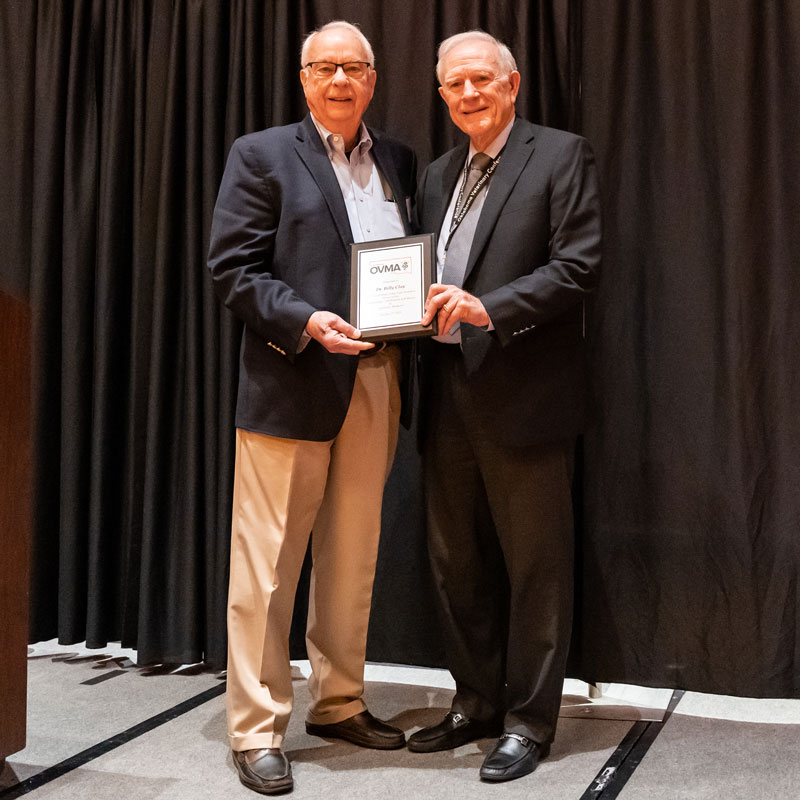 two men with award