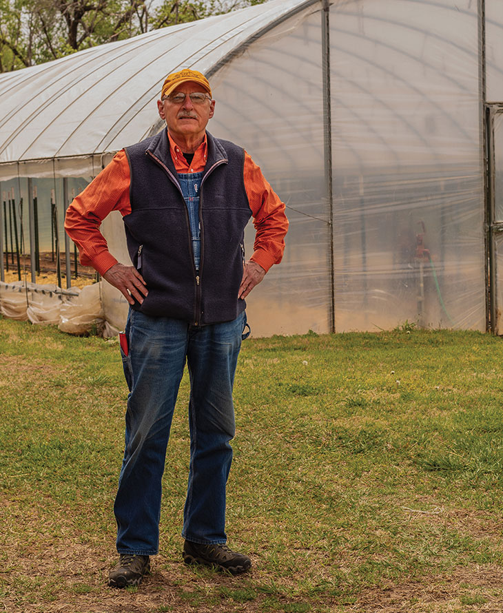 James Pickel, owner of Prairie Earth Gardens, uses a hoop house to grow crops when temperatures are too cool to have them outside