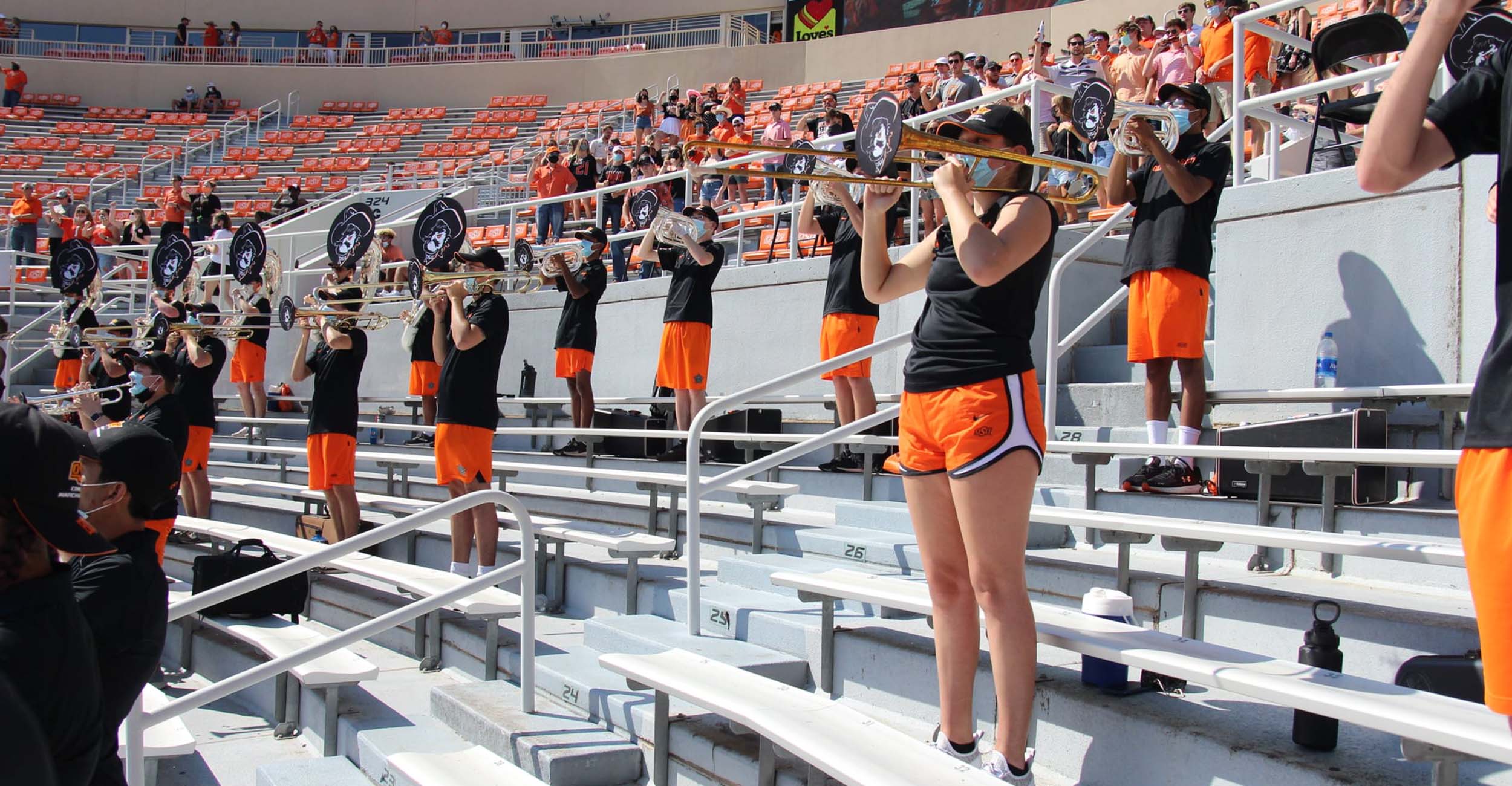 The OSU Marching Band social distances at Boone Pickens Stadium.