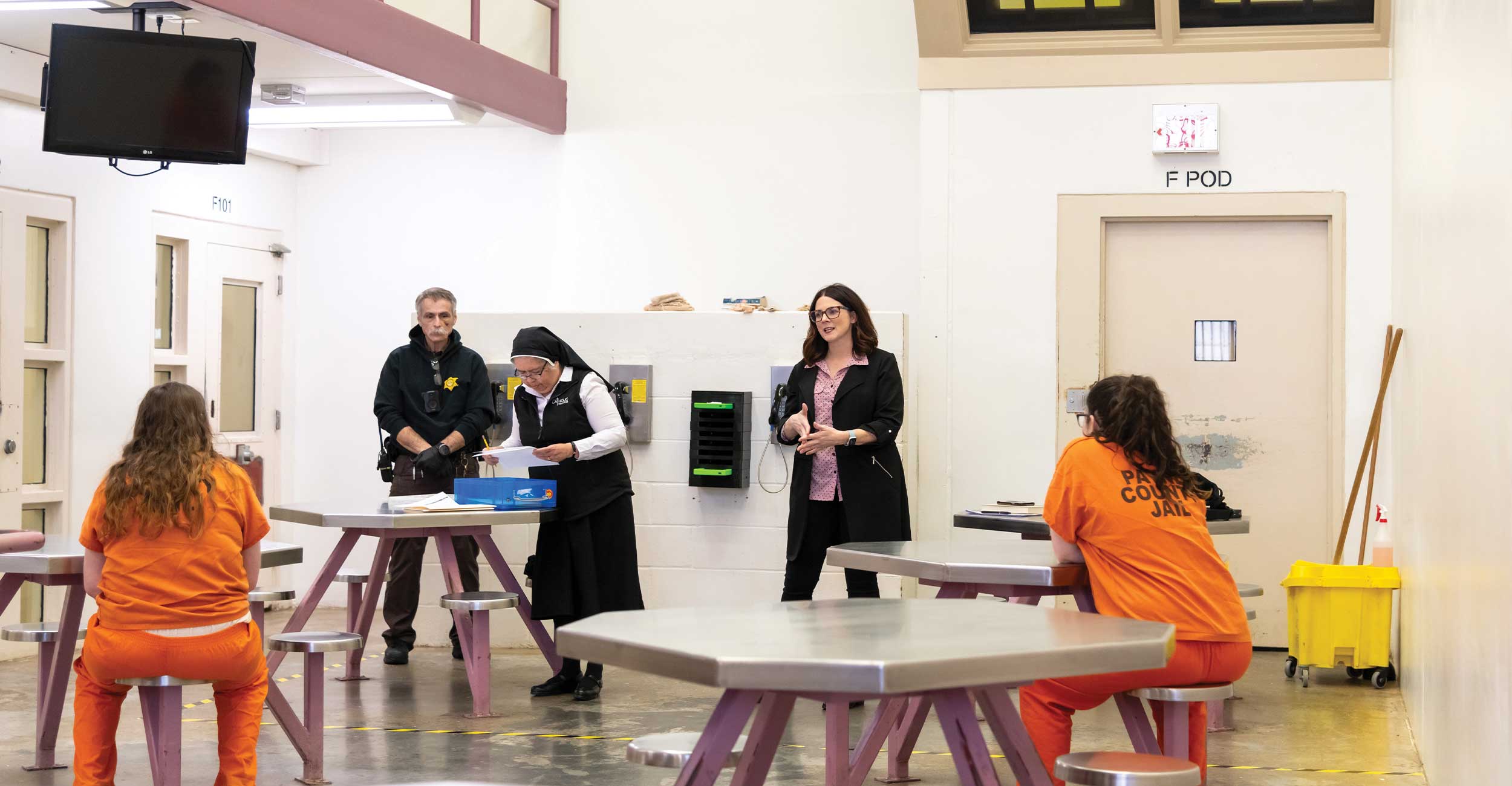 payne county inmates sit at tables taking classes to earn their high school diplomas