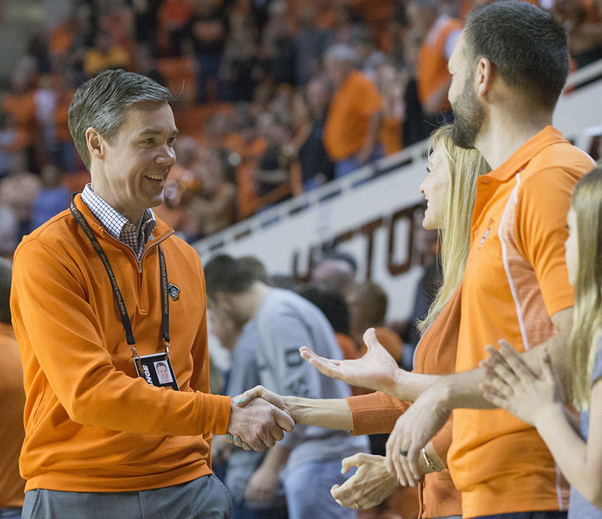 Chad Weiberg visits with OSU basketball fans.