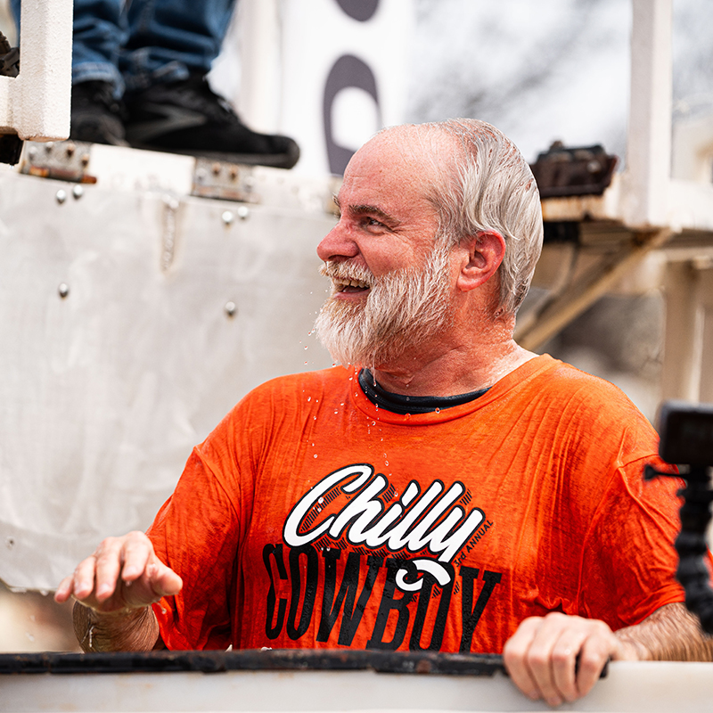 Marketing department head Tom Brown laughs after being dunked into the cold water at the Chilly Cowboy.