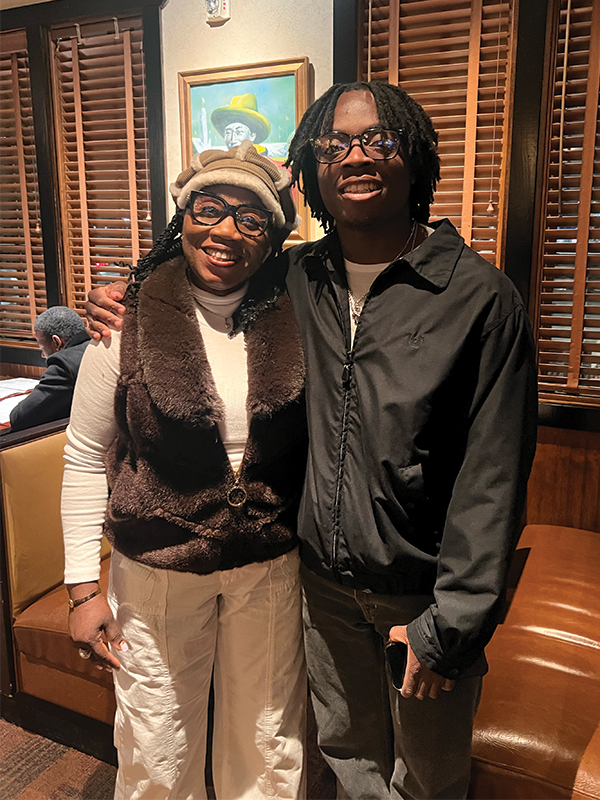 Adedoyin Abioye and her youngest son, Femi Abioye. Femi surprised Adedoyin with a Valentine's Day date, and this photo was taken at the restaurant.