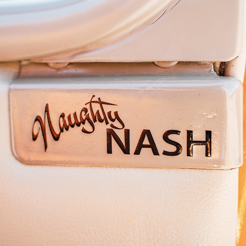 Sign on the 1936 Nash Lafayette that reads "Naughty Nash."