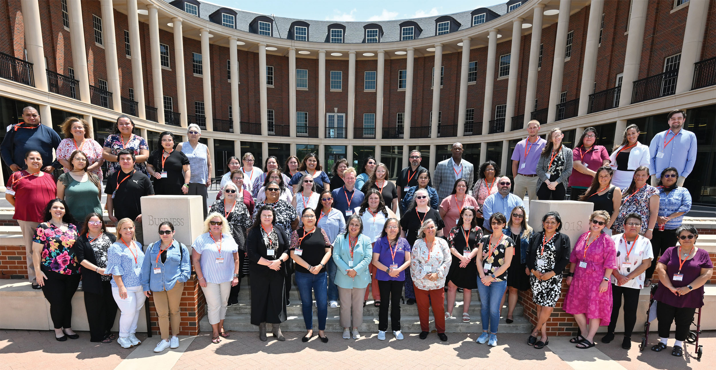 Professionals gather outside the Business Building for the in-person Introductory Tribal Finance and Accounting Certificate Program.