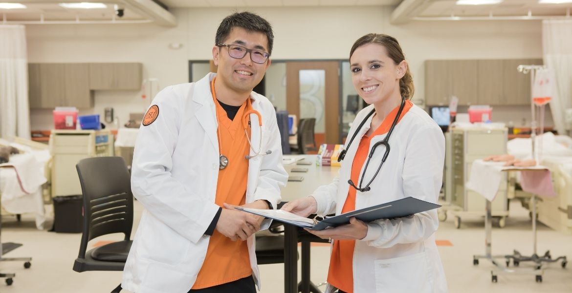 Two student nurses posing