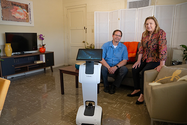 Drs. Emily Roberts and Alex Bishop test out new caregiving technology.