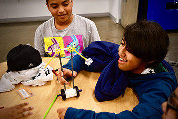 Hector Ramirez and Fernanda Velaquez build a catapult