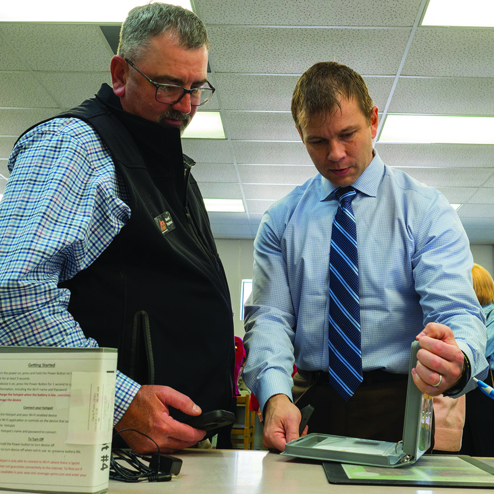 Dr. Brian Whitacre explains the Wi-Fi hotspots his team provides to rural libraries.