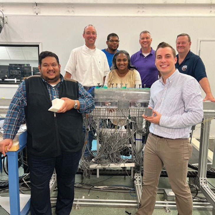 From left: Dr. James Manimala (OSU), Dr. Doug Nark, Max Reid, Martha Brown, Brian Howerton, Will Kresl (OSU) and Mike Jones at the Liner Technology Facility at NASA Langley.