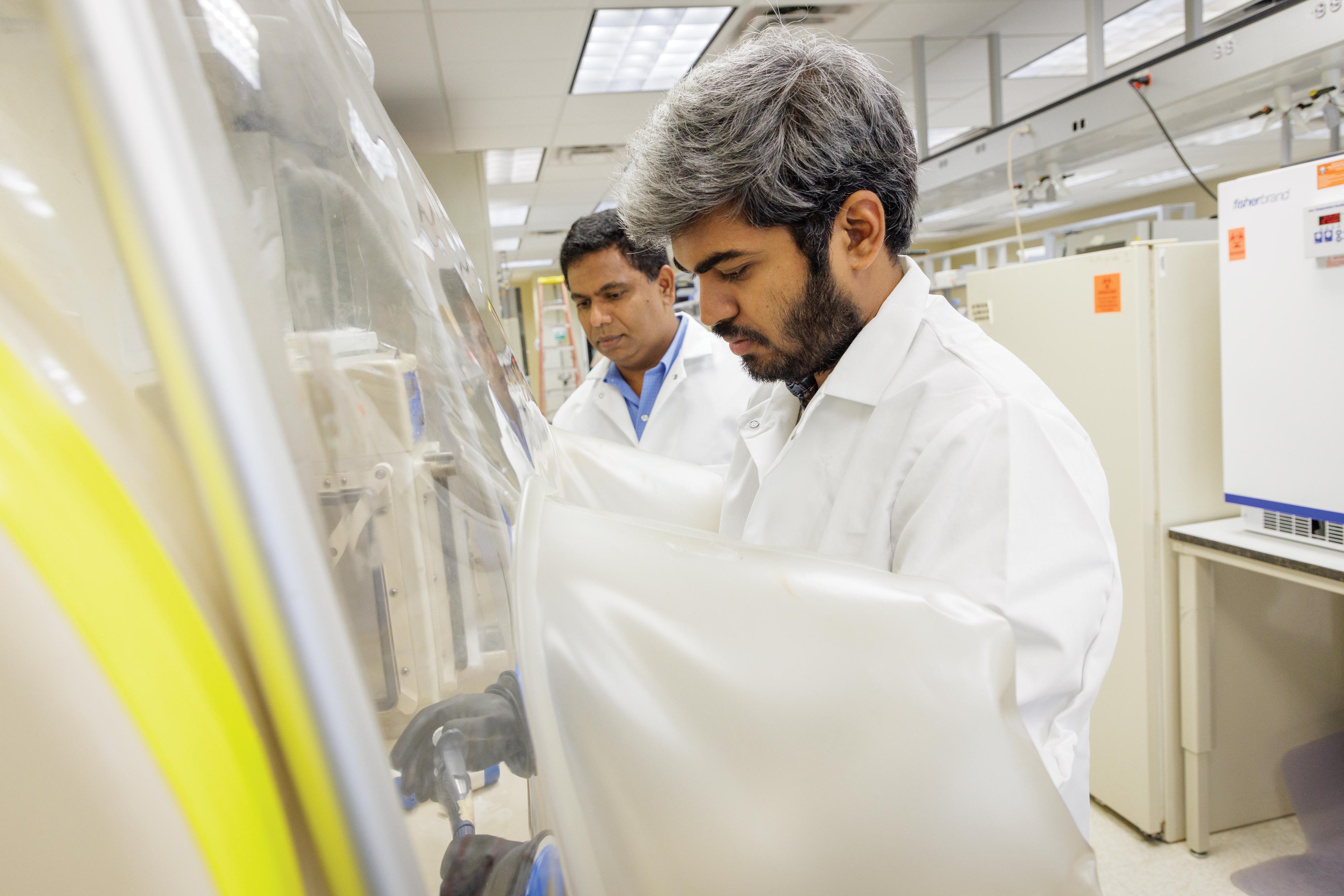 Dr. Joy Scaria and collaborator Vishnu Thayil Valappil in the lab.