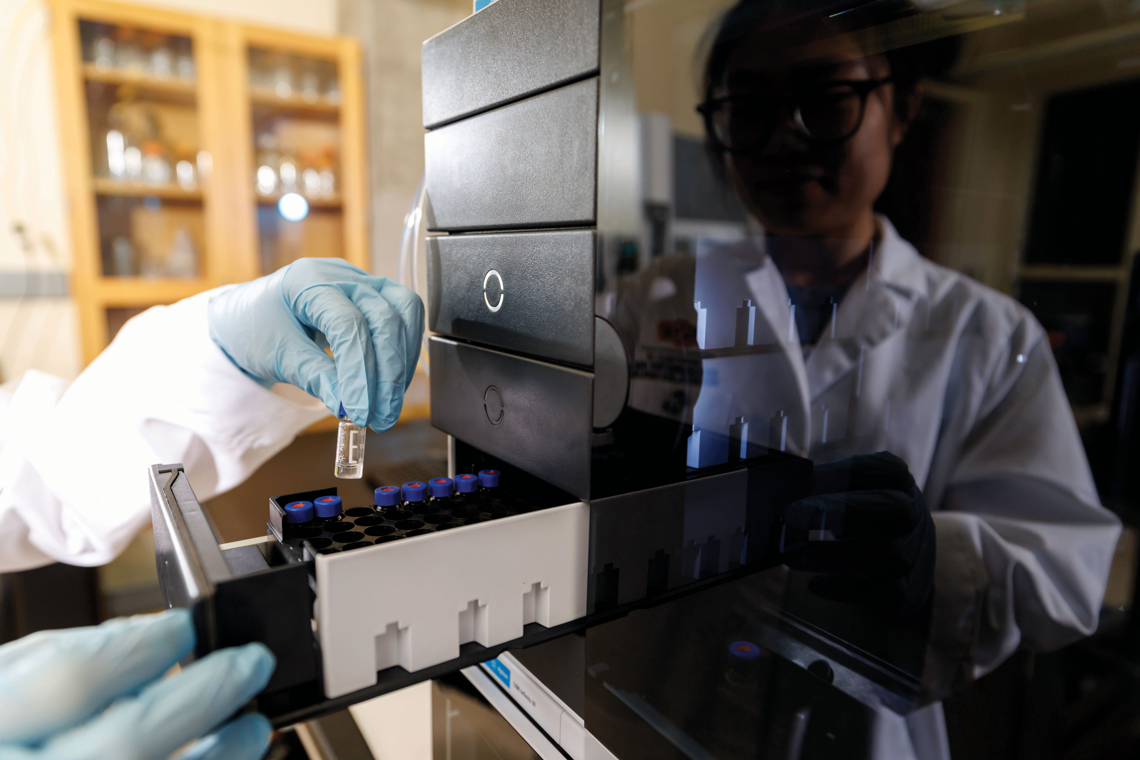 A sample vial containing a digested protein sample is ready for mass spectrometry analysis.