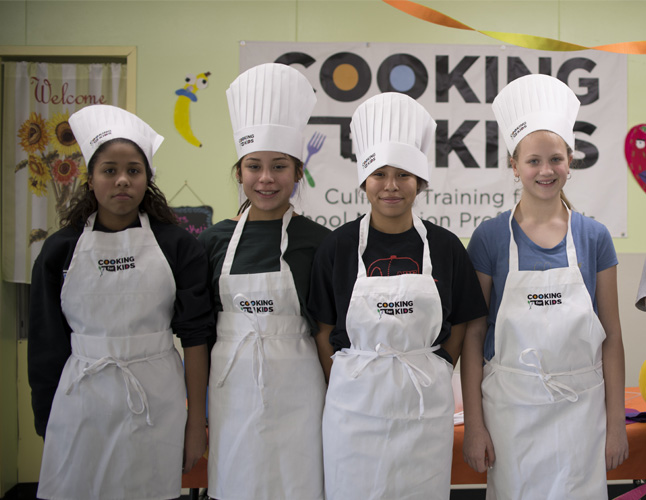 Students participating in cooking program