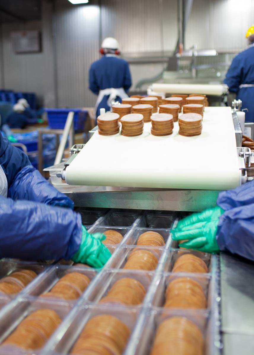 Canadian-style bacon is packaged for shipment to restaurants.