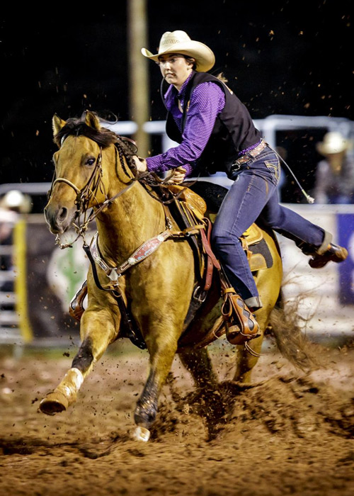 Cheyenne Bartling riding a horse.