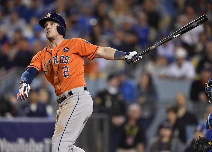 Huston Astros player hits baseball