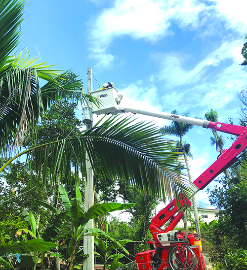 Crews worked around rough terrain and narrow roads to restore power.