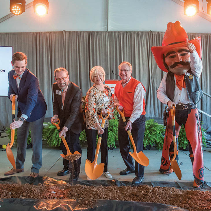 From left: OSU Flying Aggies President Jacob White, College of Education and Human Sciences Dean Stephan Wilson, flight center donor Linda Booker, OSU President Burns Hargis and Pistol Pete.