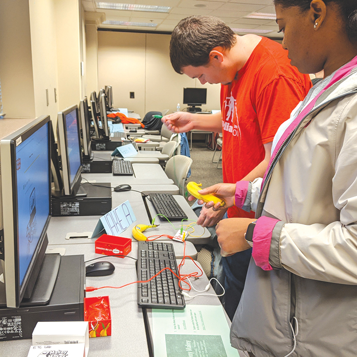 adults at computer lab