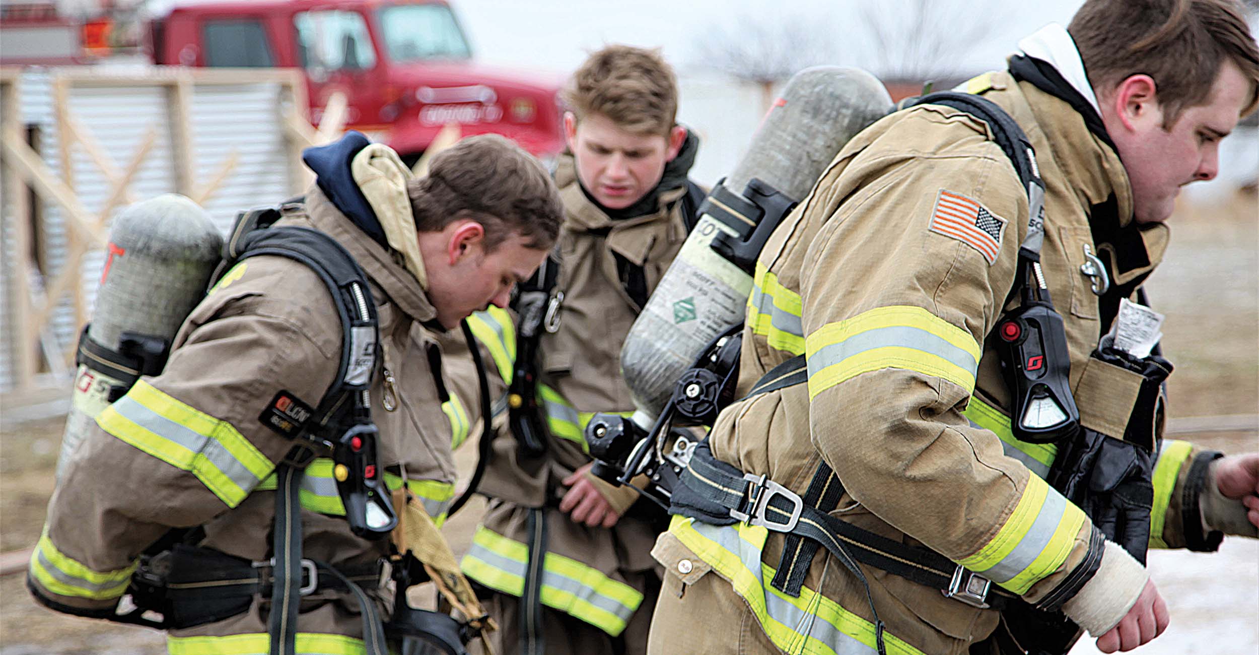 A photo of firefighters at a drill. 