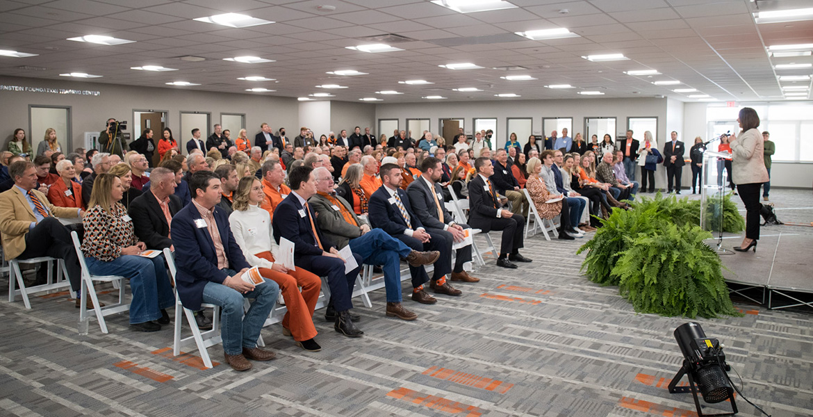 OSU Foundation President Blaire Atkinson speaks to the crowd inside the Burnstein Foundation Training Center.