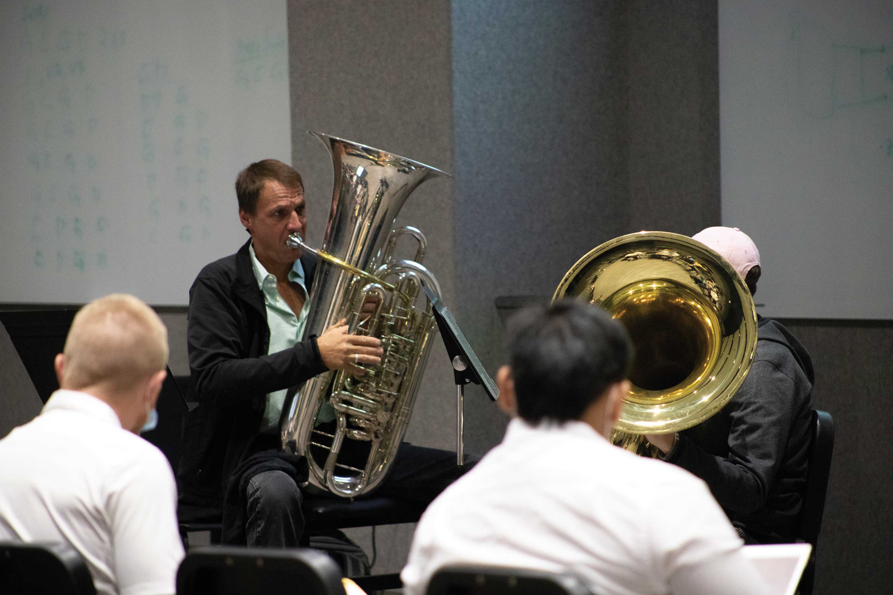 Principal tuba Alan Baer performs at a masterclass.