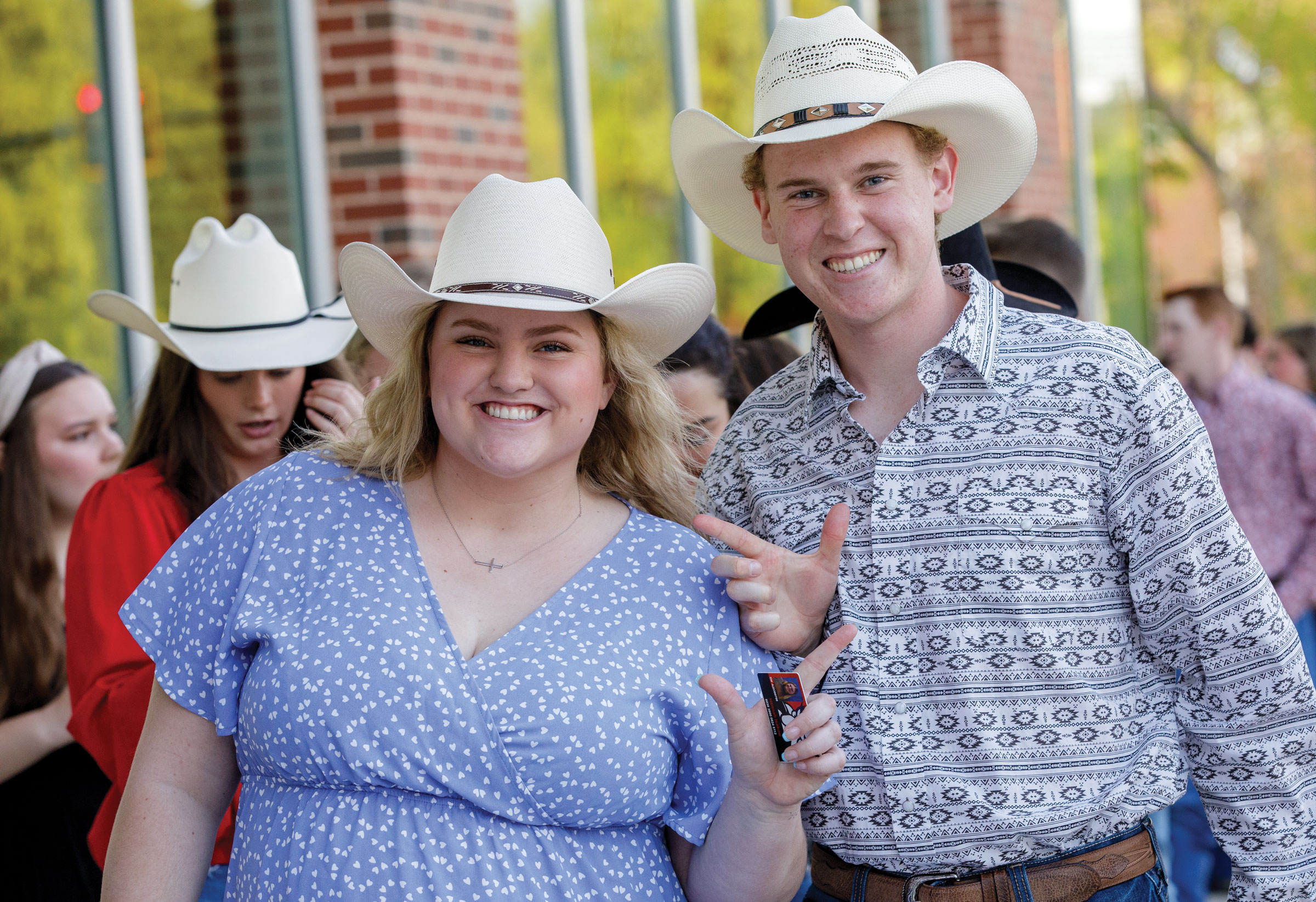 students waiting in line to watch a garth brooks concert