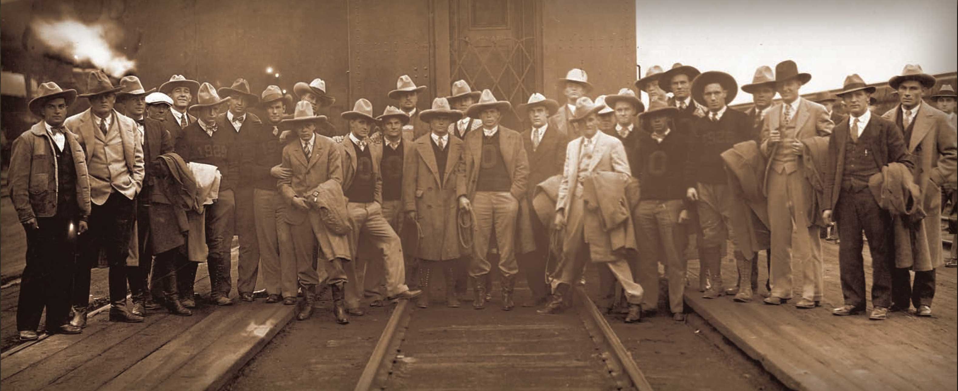 Coach John Maulbetsch’s OAMC football teamed traveled to Ann Arbor, Michigan, in 1926 and stopped to pose at a train station in route. Known for their cowboy hats and boots their opponent’s sports reporters frequently would write that “the cowboys were coming to town” when playing OAMC teams.