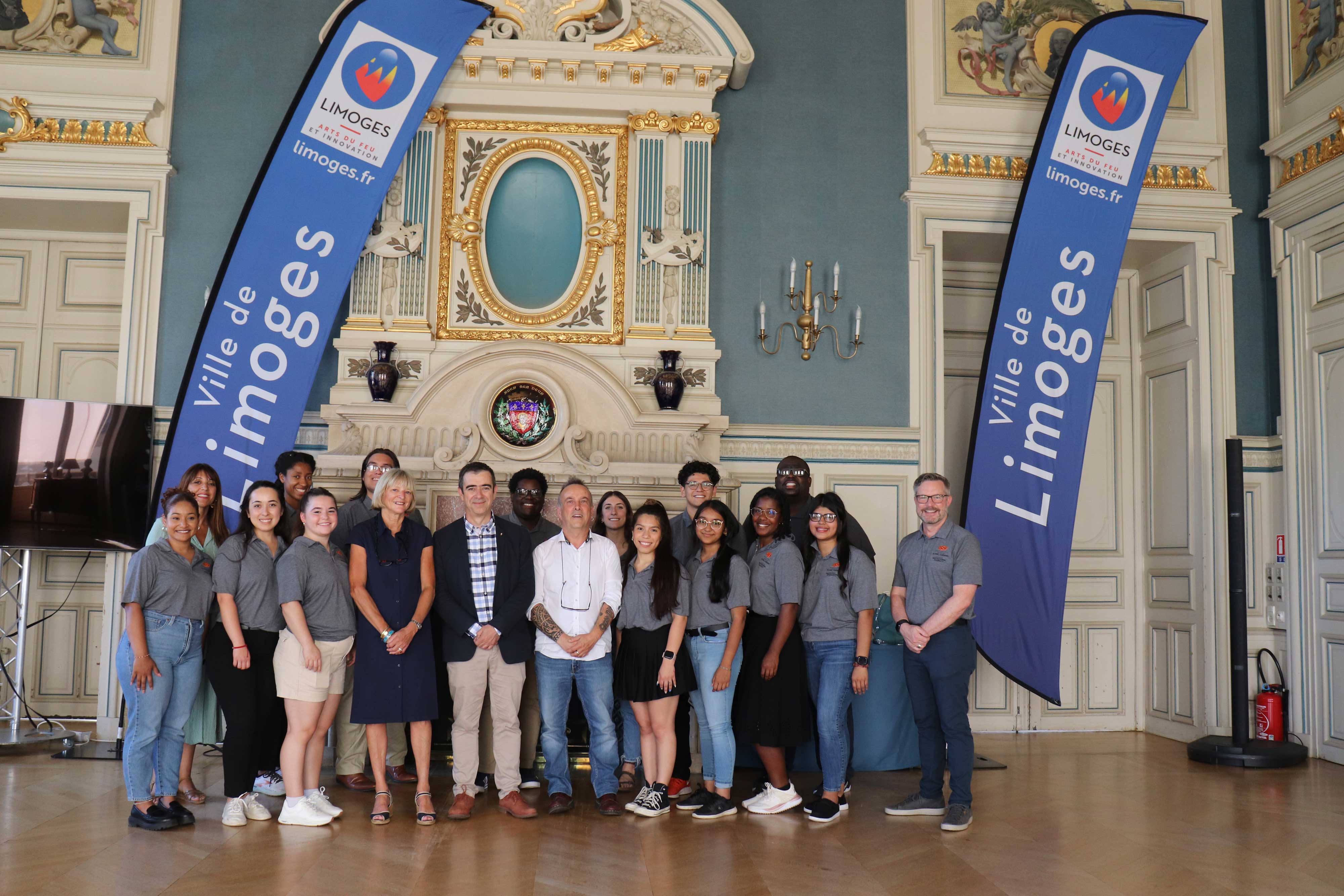 The OSU group, clad in gray shirts with the OSU logo, are joined by Limoges Deputy Mayor Isabelle Debourg, City Councilor Vincent Jalby and Laurent Bourdier, University of Limoges professor and vice president for international strategy.