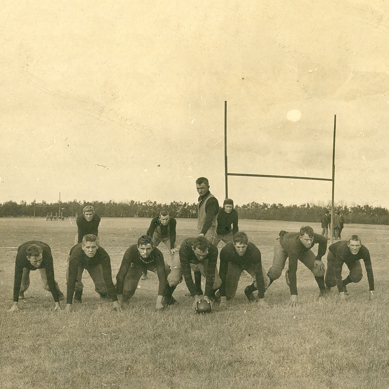 The starting lineup for the state champion 1909 OAMC football team in the “T” formation preparing for a game at the athletic grounds north of campus. It would be named Lewis Field the following year.