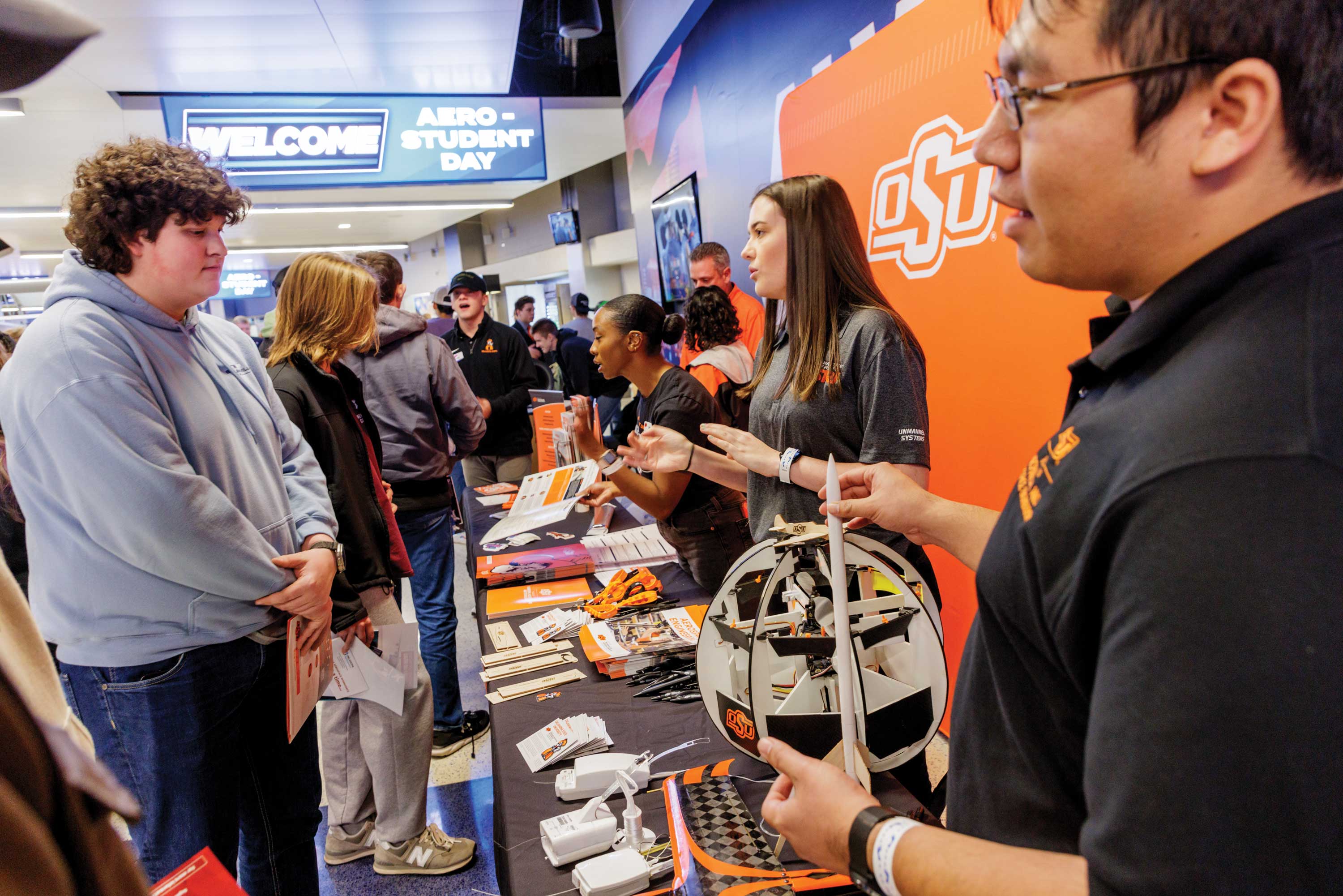 High school students talk to Oklahoma State University aerospace experts at Aero-Student Day, which is held at Paycom Center in Oklahoma City, home of the Thunder.