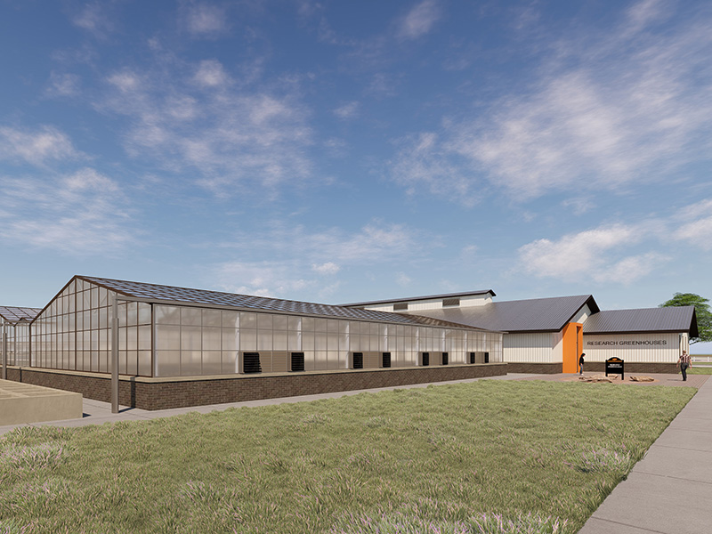 An architectural rendering shows a research greenhouse complex with connected glass greenhouse structures and support buildings situated beside a landscaped lawn and pedestrian walkway.