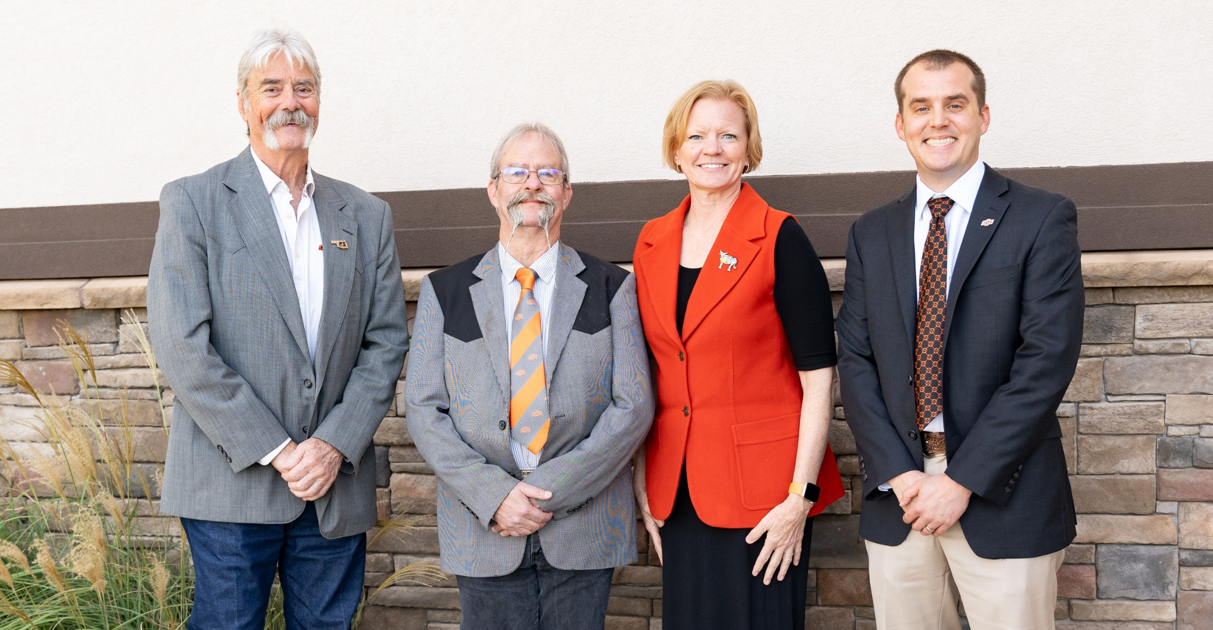 The awardees pose for a picture.