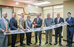 Oklahoma State University President Burns Hargis gets ready to cut the ribbon celebrating the completion of the OSU Mathematics Learning Success Center (MLSC) located on the fifth floor of the Edmon Low Library on the OSU-Stillwater campus. Pictured with Hargis are: (from left to right) William Jaco, Head of the OSU Department of Mathematics; Chris Burnett, Nabholz Construction Services Operations President; Bret Danilowicz, Dean of the OSU College of Arts & Sciences; Sheila Johnson, OSU Dean of Libraries; President Hargis; Calvin Anthony, OSU/A&M Board of Regents; Robert Sternberg, OSU Provost & Senior Vice President; and Chris Francisco, Assoc. Head of Lower Division Mathematics at OSU. Its estimated more than 8,000 students will use the services provided by the MLSC each year. The center will open to students this summer.