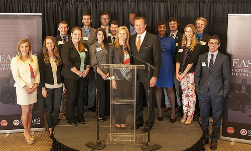 Joseph and Monica Eastin (center) meet with Spears School of Business students at the official announcement of the Eastin Center for Talent Development.