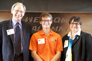 Left to right: John McDonald, Anthony Gaskill, Noel Schulz, Ph.D., McDonald and Schulz, past and present chairs of the IEEE Power and Energy Society, congratulate OSU Senior Anthony Gaskill on his John W. Estey Outstanding Scholars Award.