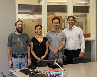 Lead researchers gather outside the new state-of-the-art infrared core facility lab located inside OSU’s Henry Bellmon Research Center. From left to right are Wouter Hoff, Aihua Xie, Junpeng Deng and Robert Burnap.