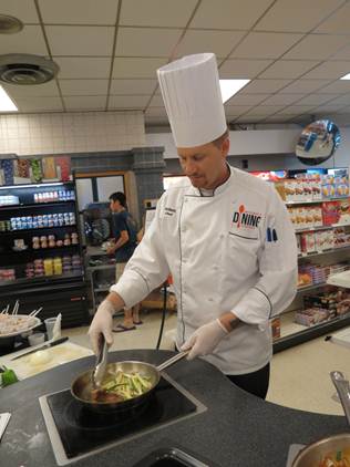 UDS Executive Chef Donald Pritchett hosts a Healthy Dining cooking demonstration in an on-campus convenience store. All ingredients used in the cooking demos can be purchased in-store.