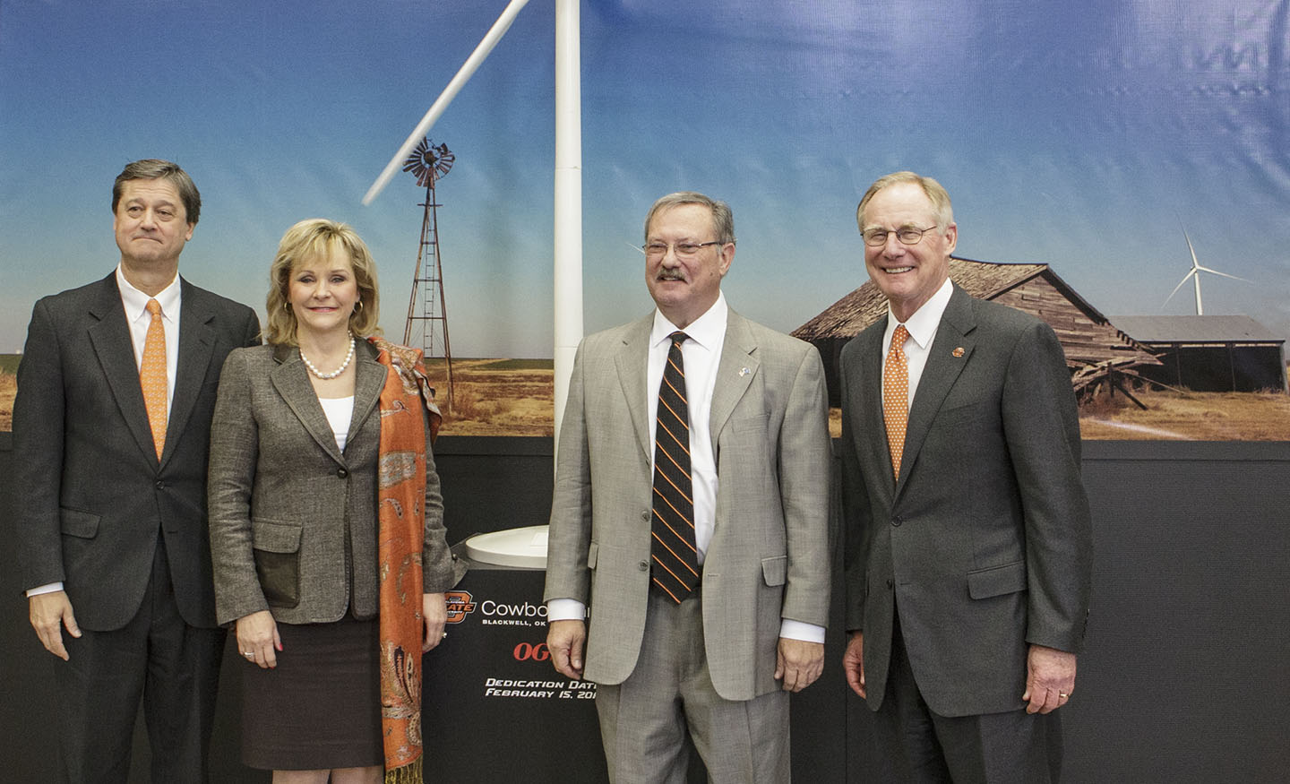 Governor Mary Fallin is joined by (from left to right) OGE Energy Corp. Chairman, CEO and President Pete Delaney, Blackwell Industrial Authority trustee Mike Loftis and OSU President Burns Hargis at the dedication of the OSU Cowboy Wind Farm held Friday, Feb. 15 on the campus of OSU-Stillwater. The windfarm, located near Blackwell, Okla., is the result of a 20-year agreement between OSU and OG&E. OSU now receives a majority of its electricity from wind generation.