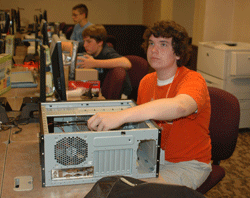 High school students learn how to build a computer from scratch during the 2011 ISyTE Academy, sponsored by Oklahoma State University’s Department of Management Science and Information Systems.
