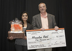 Last year's winner Mrinalini Patil receives $1,000 scholarship.