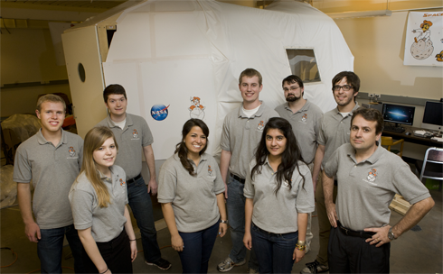 The Space Cowboy’s pose for a photo before leaving for NASA Johnson Space Center’s Ellington Field in Houston. On April 23, the team will conduct experiments aboard the “Weightless Wonder” aircraft. Pictured are, from left, front, Alyssa Avery (team leader), Nicole Weidman, Carolina Vega Recalde, and faculty advisor Jamey Jacob. Back, Thomas Verschelden, Calvin Brown, Zach Barbeau, Jaymie Jordan and James Evans.