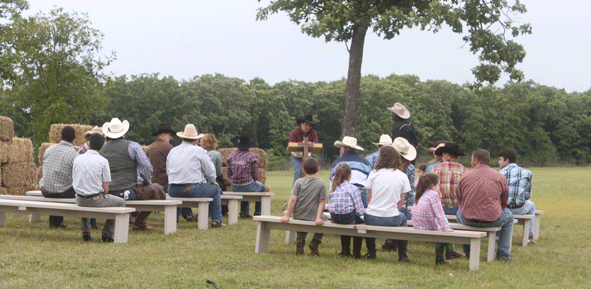 A scene involving a cowboy preacher is filmed during