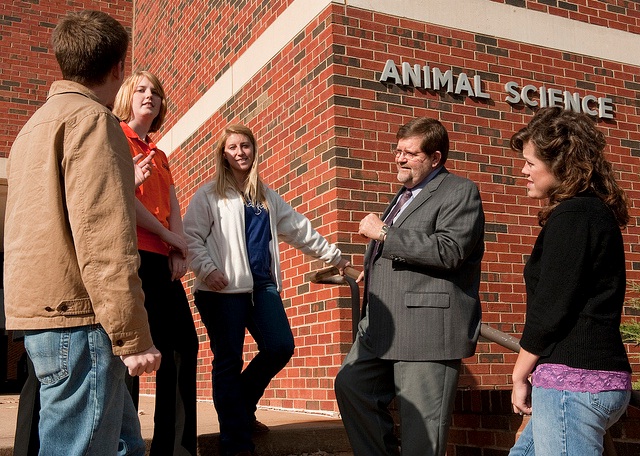 Oklahoma State University’s Steve Damron has been named the 2010 Oklahoma Professor of the Year by the Carnegie Foundation for the Advancement of Teaching and the Council for Advancement and Support of Education (CASE). Here he is talking with students on the front steps of Animal Science. Students: Hattie Kurin (White Jacket), Emily McCullough (orange Polo), Erin Boger(Black Peacoat), Jaret Fipps (brown jacket), Anna-Lisa Giannini (black sweater).