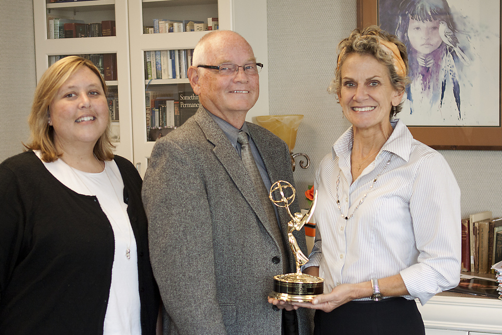 Cathy Graves and Dr. Steve Marks of OSU’s NASA Education Projects and College of Education Dean Pamela Sissi Carroll display the Emmy Award.