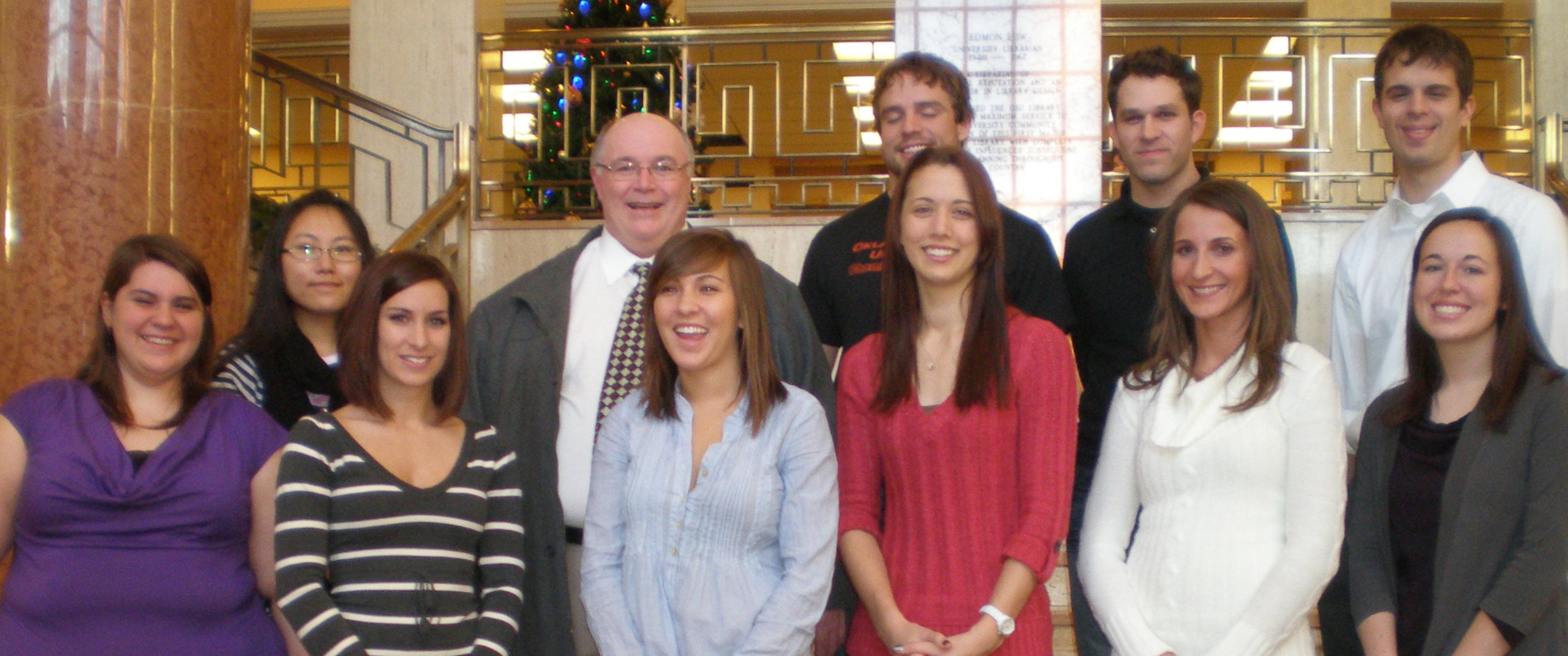 Front row from left: Victoria Jurenko, Kimberly Skillern, Tiffany Vincent, Amanda Bentley, Emily Steinert, Meredith Savage. Back row from left: Peilin Shi, Dr. David Henneberry, Brady Burkhart, James Johnston, John Cook. Not Pictured: Eric Spencer