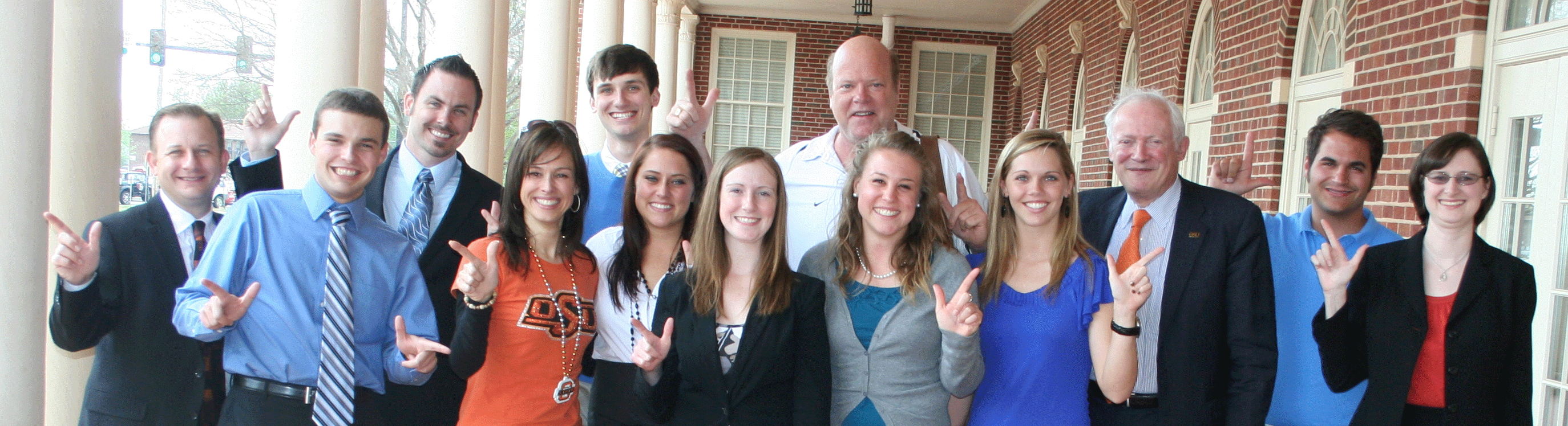 Top 10 Students meet with College of Arts and Sciences at Murray Hall on the OSU campus. Front row from left: Dawson Metcalf; Renee Derese, guest of Rex Linn; Stacey Dunbar; Lydia Meador; Stefanie Krull; Blaine Bertrem; Regents Professor Peter M.A. Sherwood, dean of the OSU College of Arts and Sciences; John Brooks; and Amy Martindale, director of Student Academic Services for the College of Arts and Sciences. Left to right/back row: Jason Caniglia, vice president of development for the College of Arts and Sciences; Steven Ortman; Brent Harkrider; and alumnus and actor Rex Linn.